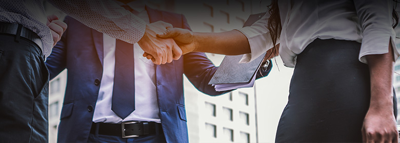 Better customer relationships with Microsoft Dynamics 365 Sales Businessmen shaking hands